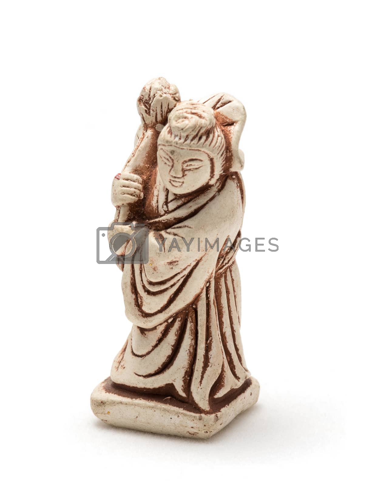 Royalty free image of Netsuke of old woman in a dressing gown. Isolated by dpetrakov