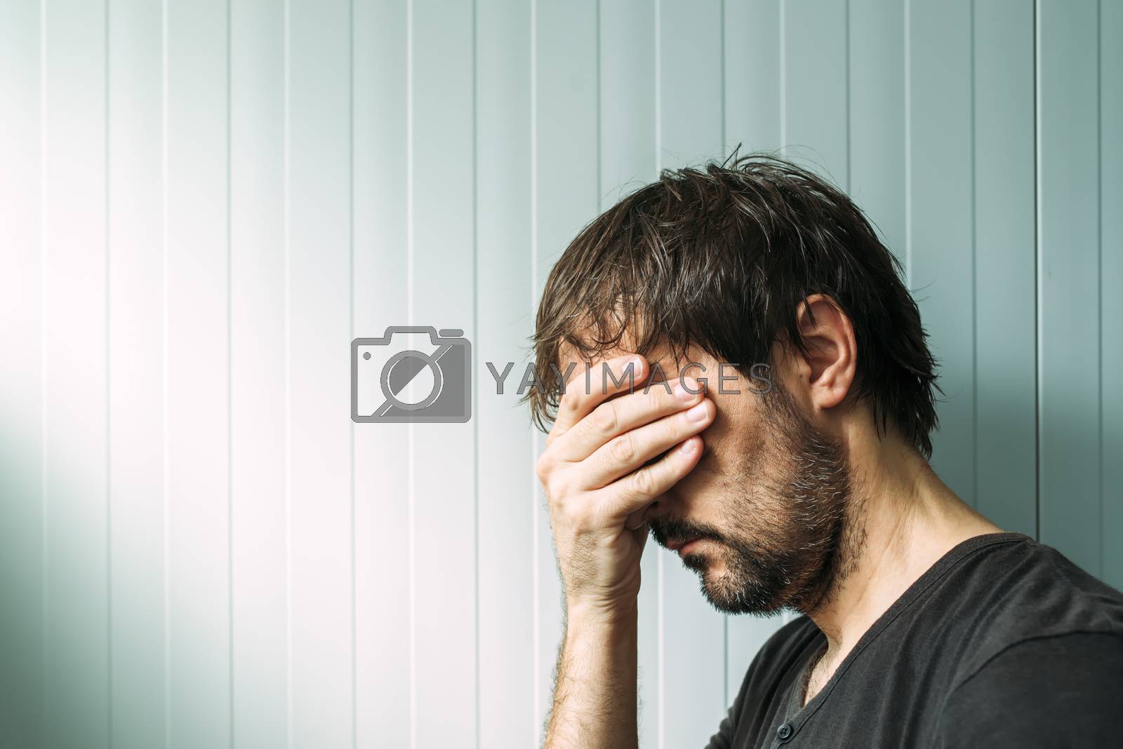 Royalty free image of Profile portrait od miserable troubled man by stevanovicigor