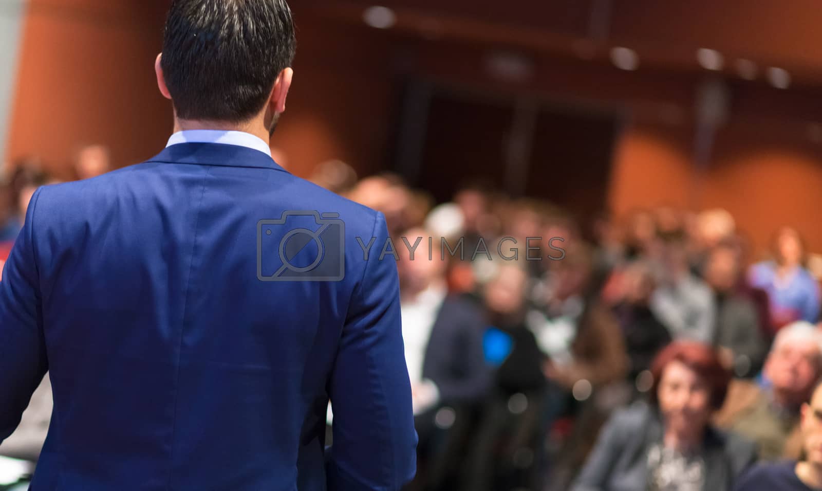 Royalty free image of Public speaker giving talk at Business Event. by kasto