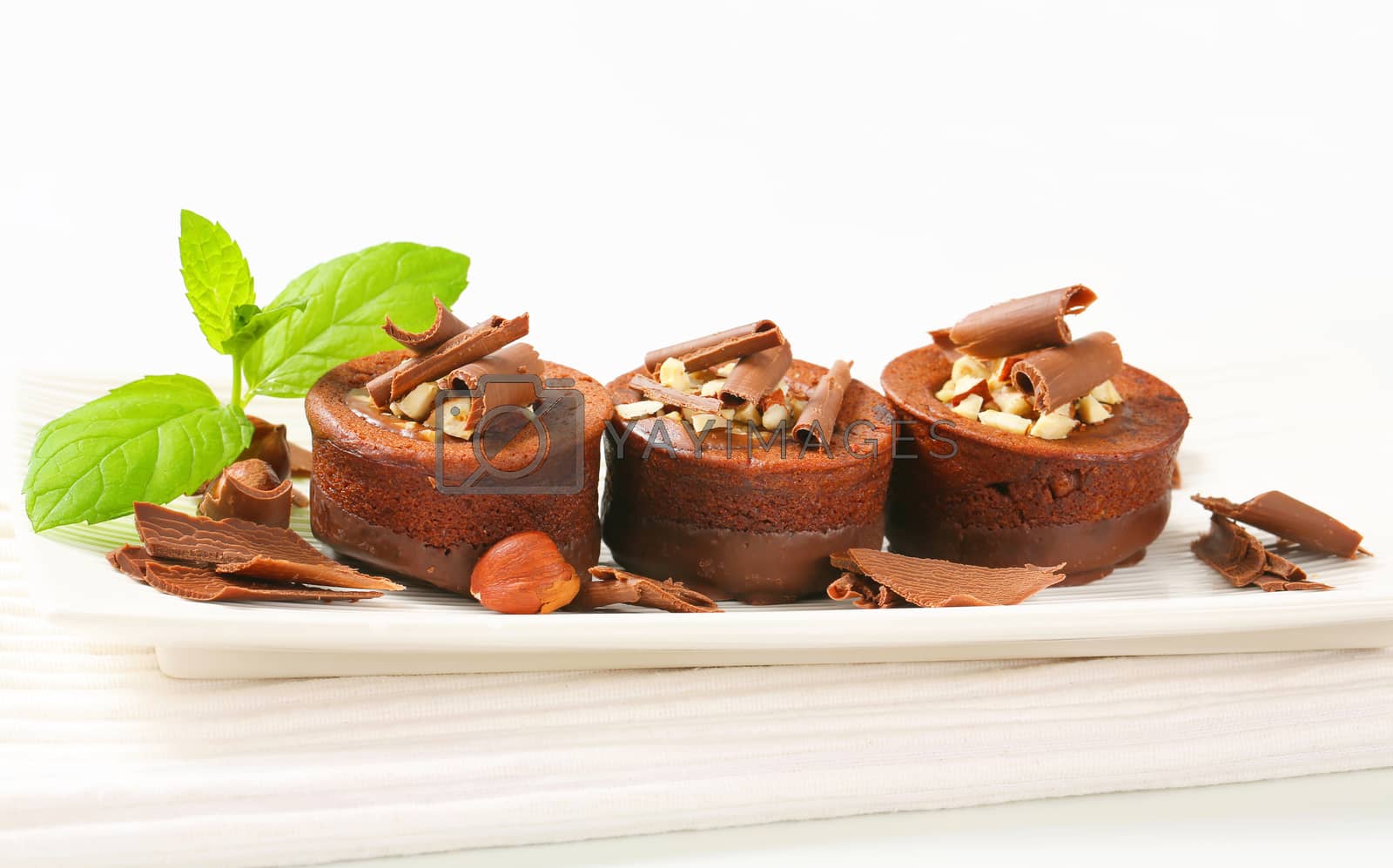 Royalty free image of Mini chocolate hazelnut cakes by Digifoodstock