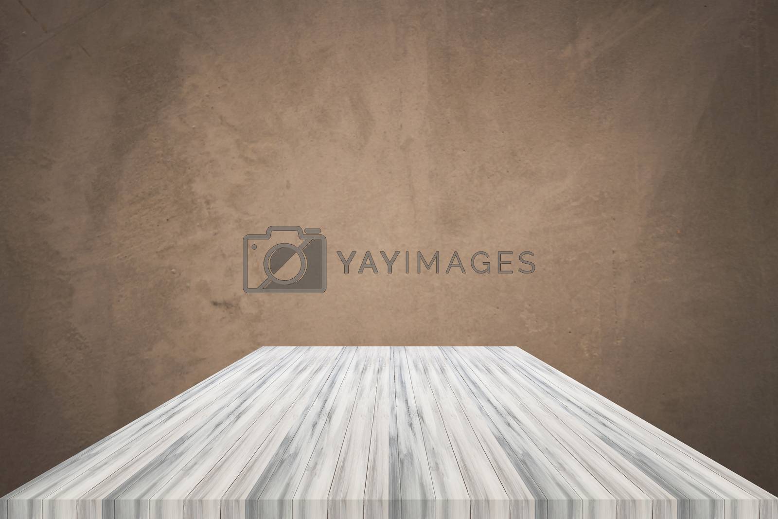 Royalty free image of Empty white wooden table top with concrete wall background by punsayaporn