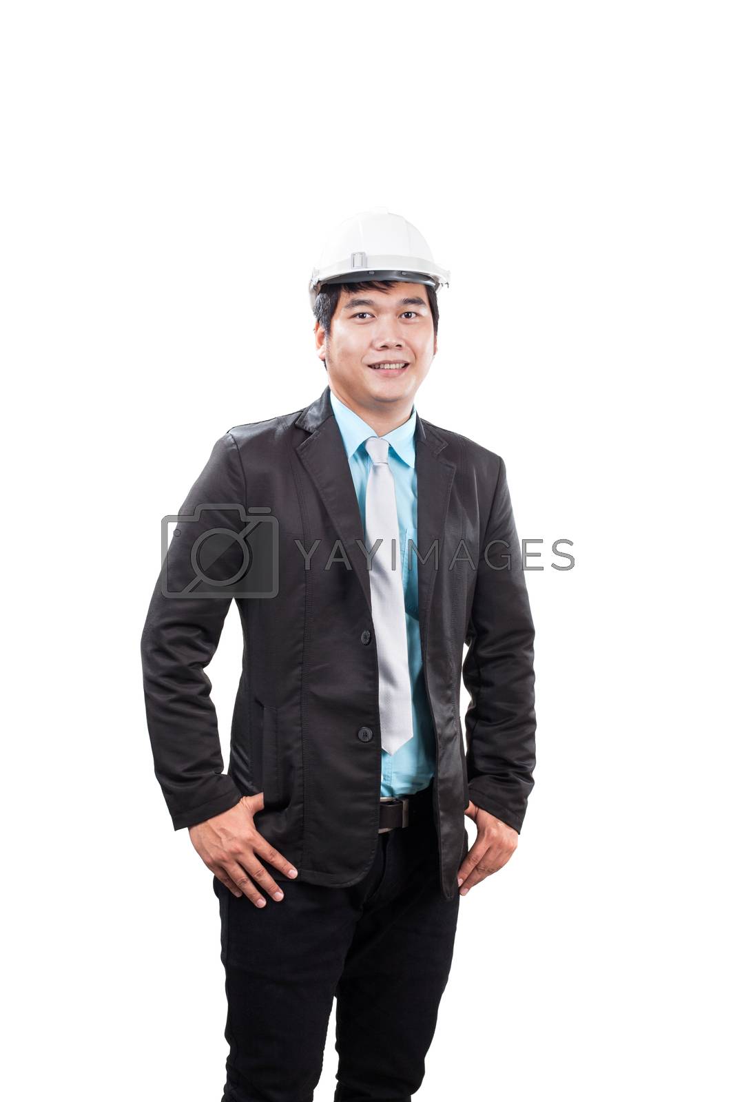 Royalty free image of engineering man wearing white safety helmet standing and smiling by khunaspix