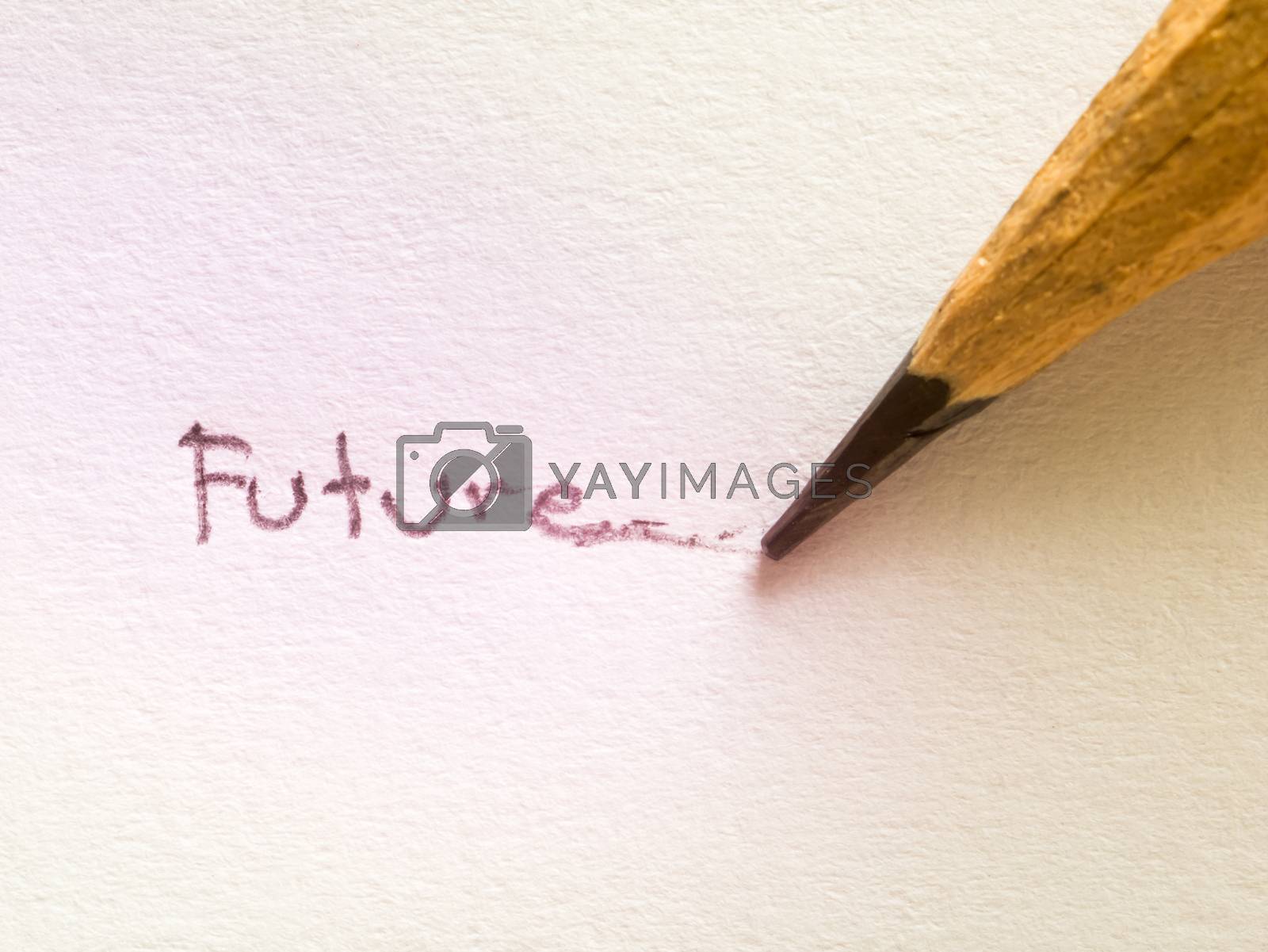Royalty free image of Future wording on paper with pencil by hadkhanong