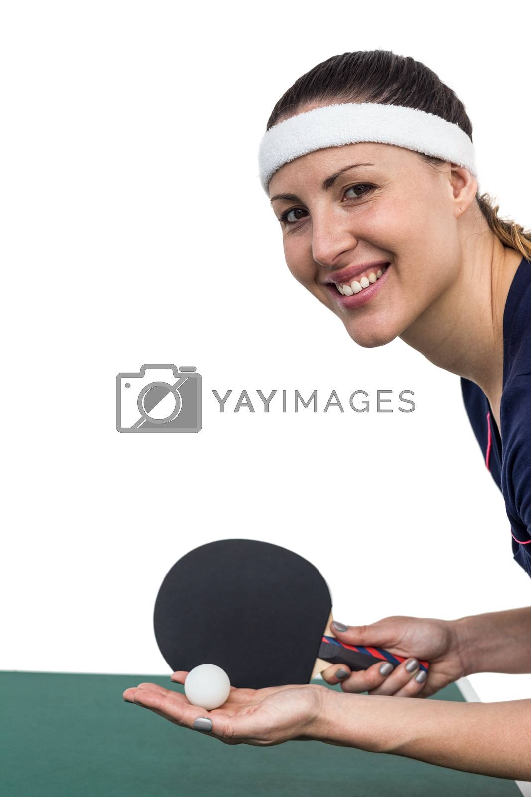 Royalty free image of Female athlete playing table tennis by Wavebreakmedia