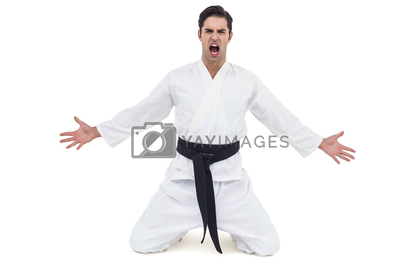 Royalty free image of Fighter posing after victory by Wavebreakmedia