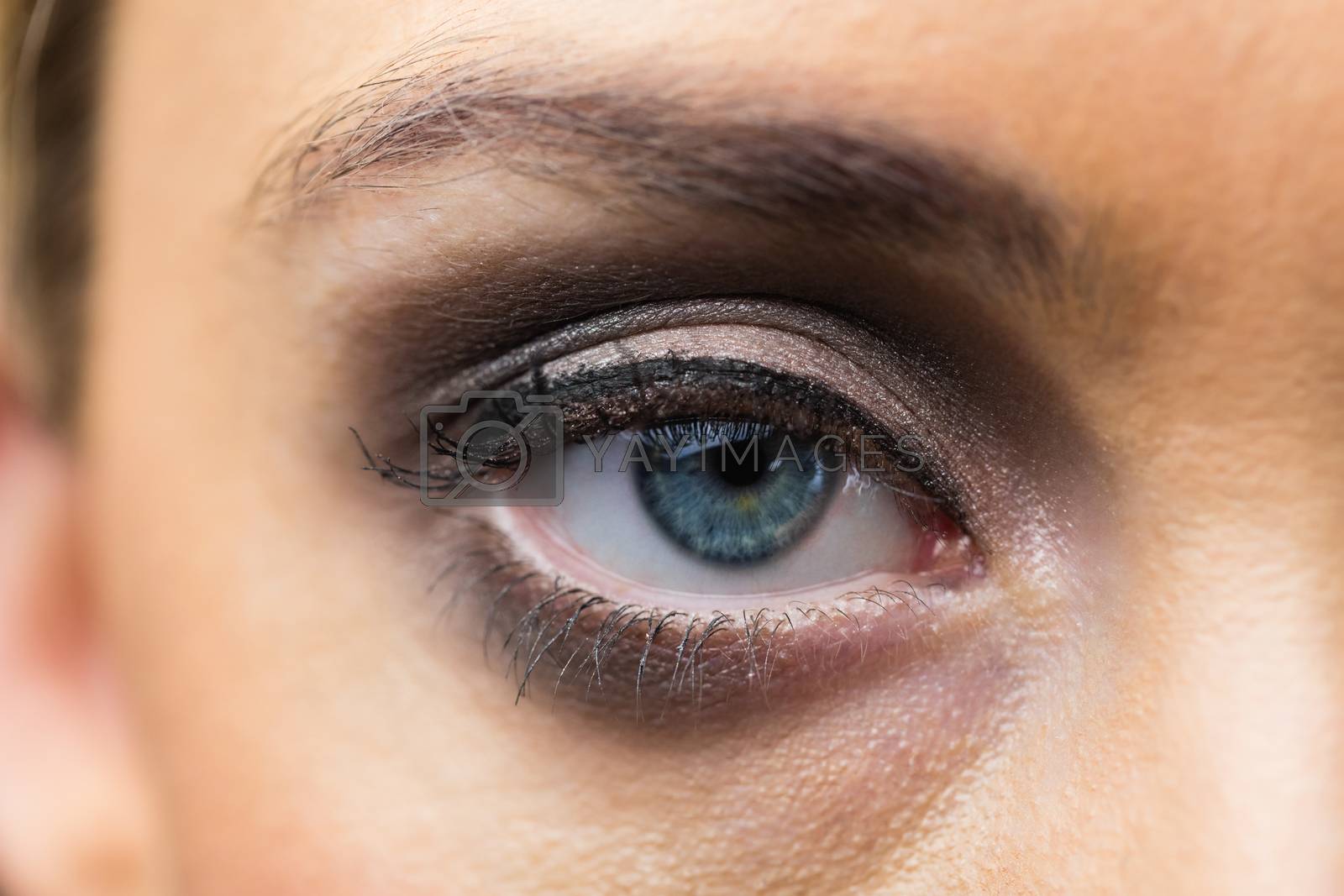 Royalty free image of Focus on eyes makeup with opened eyes by Wavebreakmedia