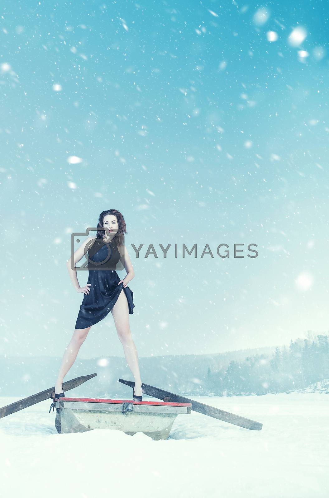 Royalty free image of attractive fashion girl, winter and snow scene by fotoduki