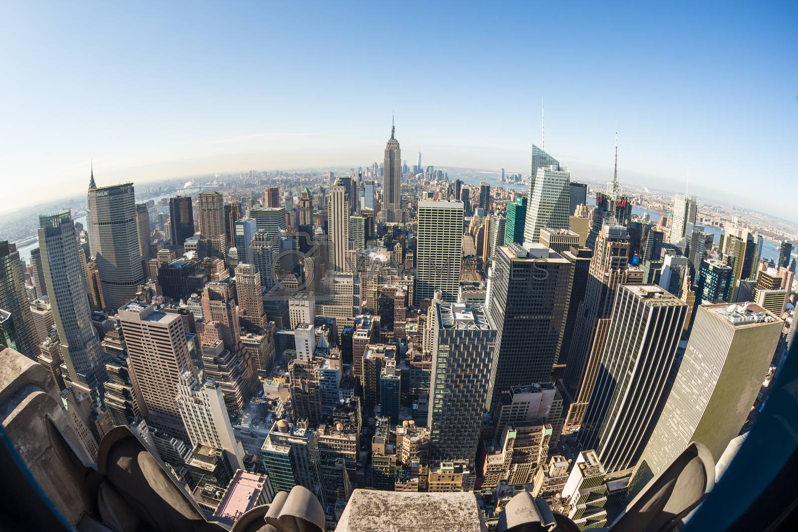 New York City, United States of America - March 24: Manhattan downtown skyline with Empire State Building and skyscrapers seen from Top of the Rock observation deck on March 24, 2015.