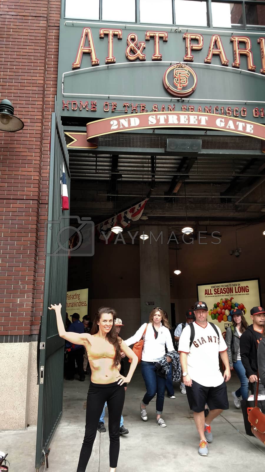 Royalty free image of Alicia Arden the "Hoarding: Buried Alive" actress spends Easter-Eve at AT&T Park for the Giants/Rockies Game wearing an orange bikini with the price tage still attched, AT&T Park, San Francisco, CA 04-15-17/ImageCollect by ImageCollect