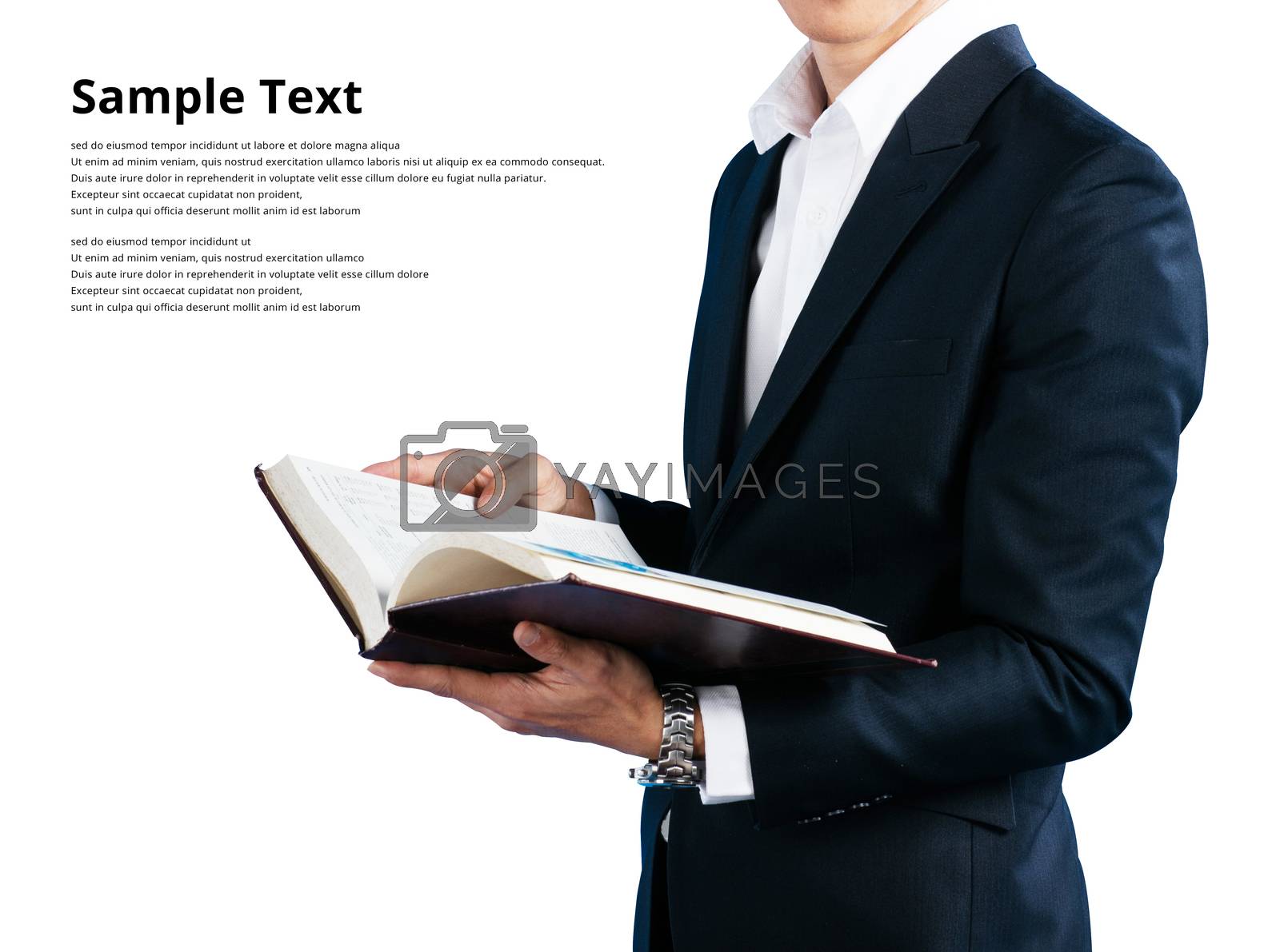 Royalty free image of Businessman wearing in a suit wearing suit, holding book isolate by phochi