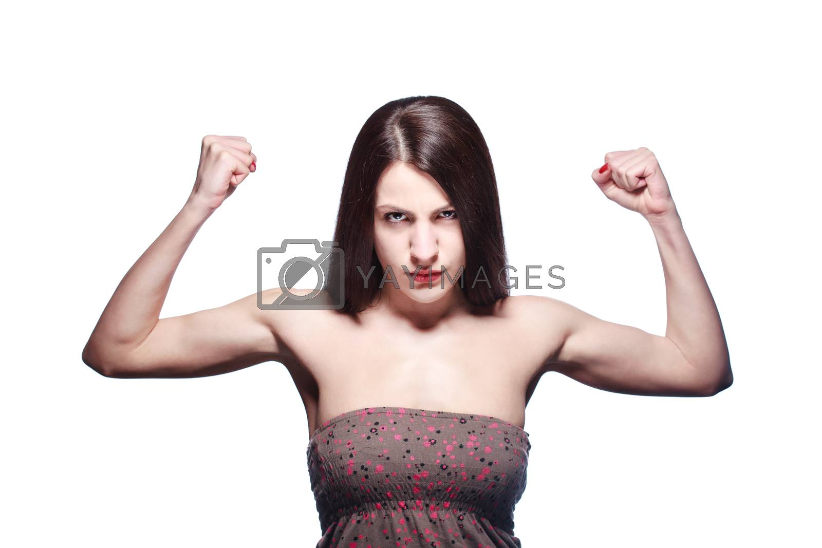 Royalty free image of girl showing muscles by kokimk