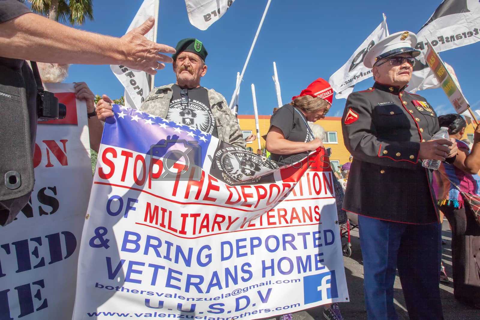 Royalty free image of Veterans with Banners at Nogales Border Action by Creatista