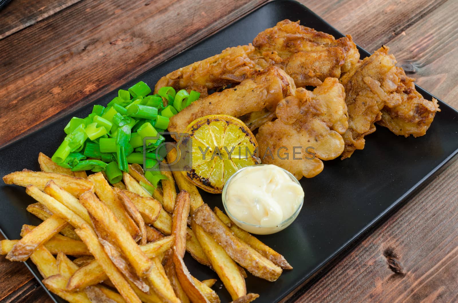 Royalty free image of Fish and chips with homemade mayonnaise by Peteer