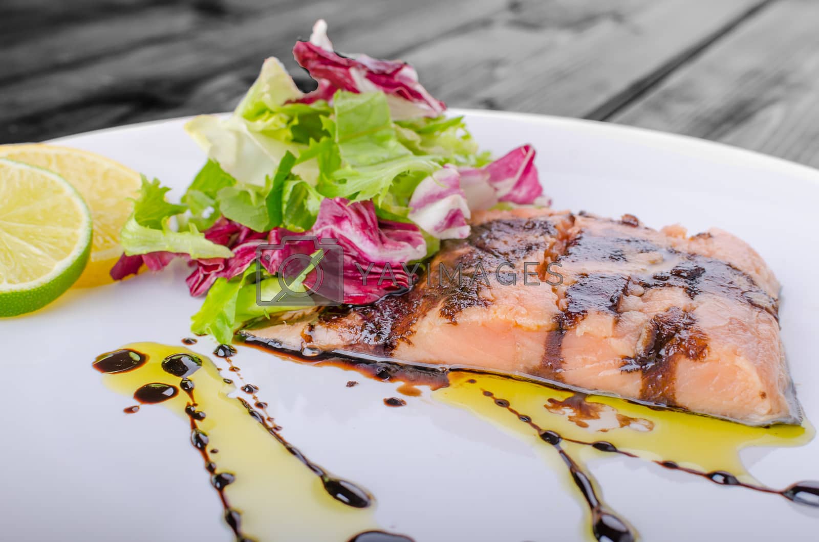 Royalty free image of Salmon with a reduction of balsamic vinegar and sugar by Peteer