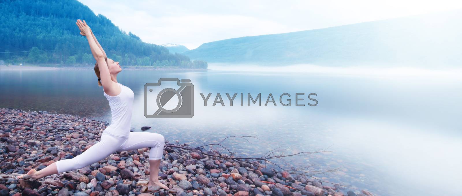Royalty free image of Yoga woman near fjord by destillat