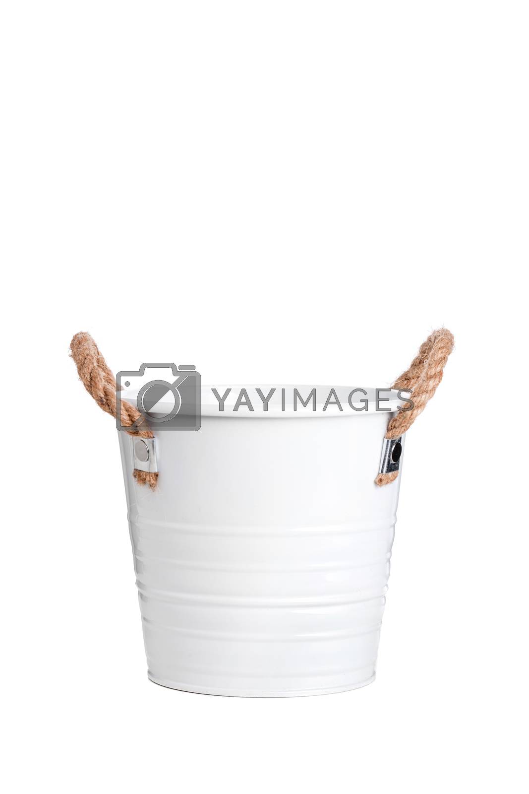 Royalty free image of white bucket with rope handles by kokimk