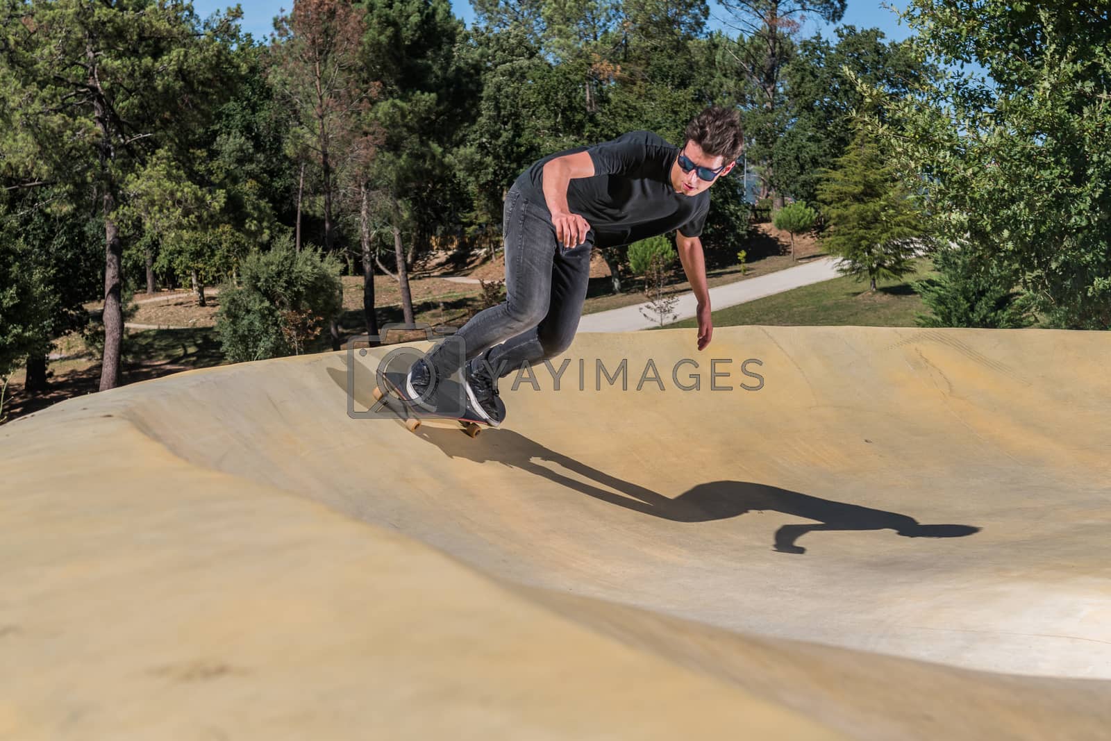 Royalty free image of Skateboarder on a pump track park by homydesign
