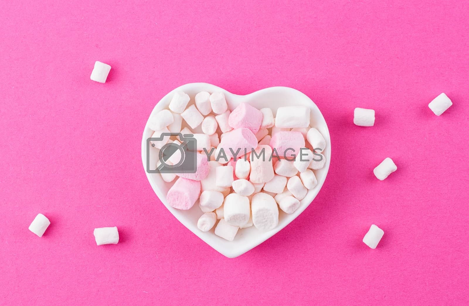 Royalty free image of heart-shaped plate with marshmallows by victosha