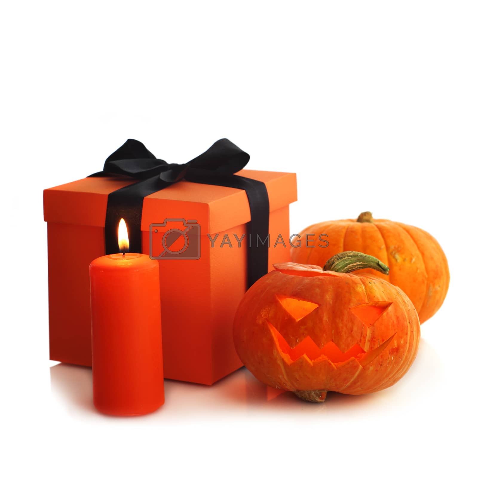 Royalty free image of Halloween pumpkin and gifts by destillat