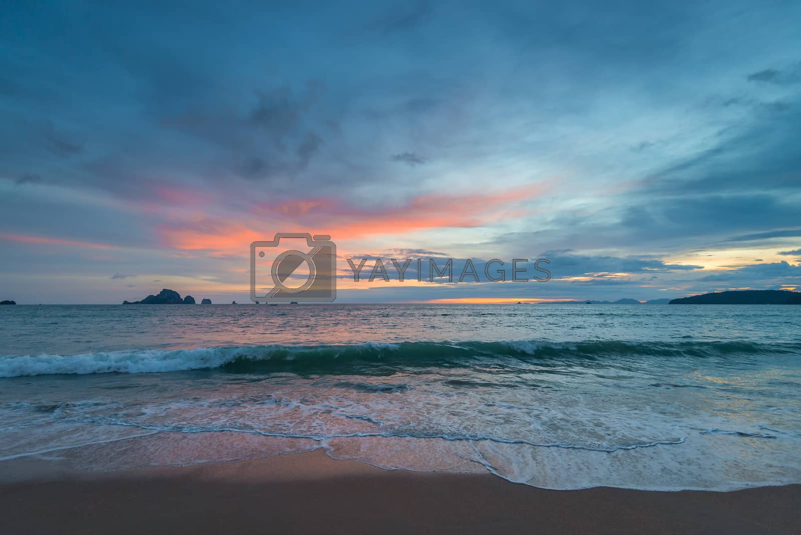 Royalty free image of beautiful sea waves and mountains on the horizon, evening time by kosmsos111