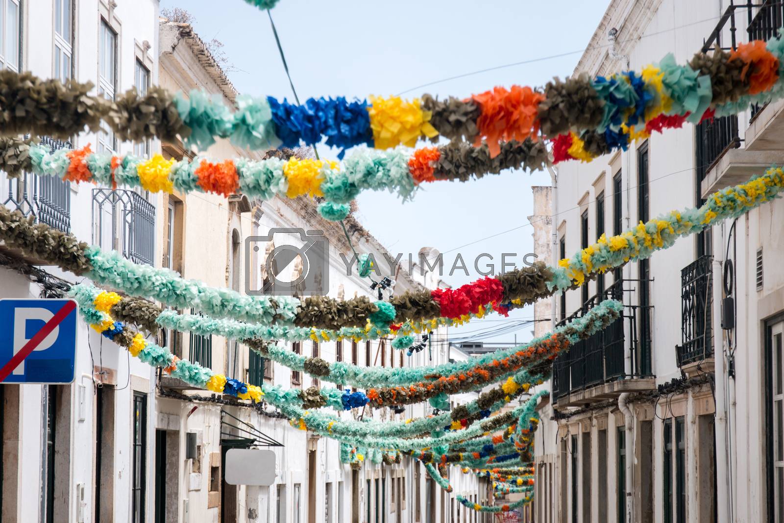Royalty free image of Popular Saints decoration in a street by membio