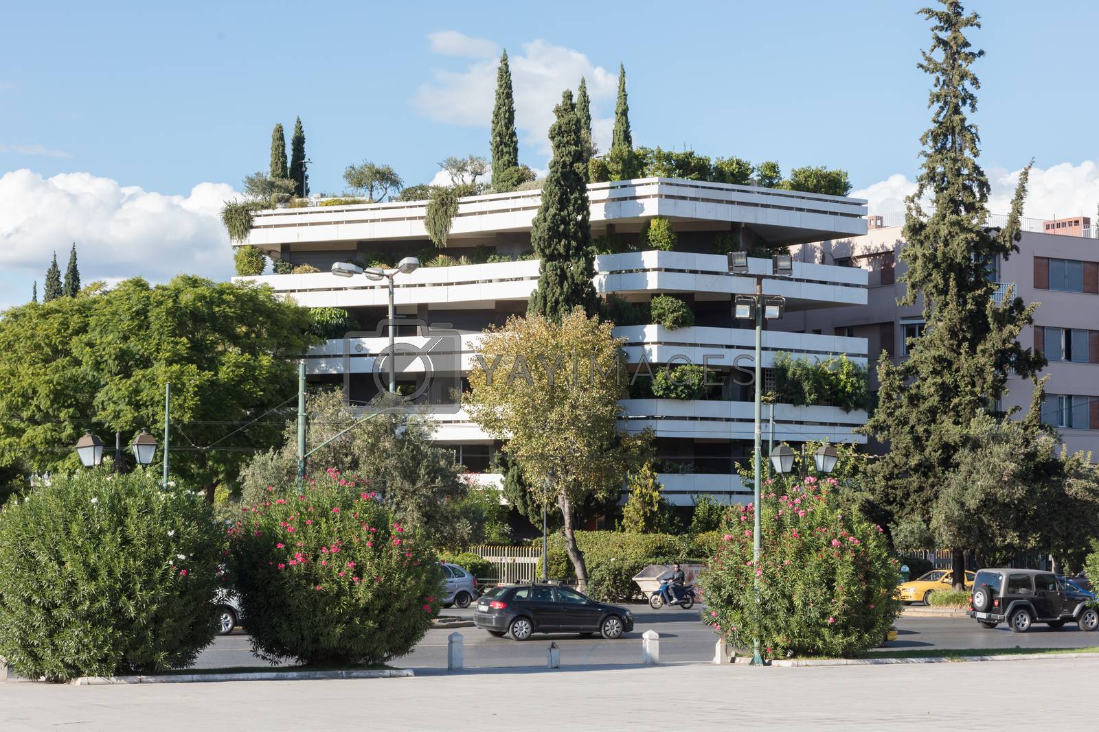 Royalty free image of Block of flats in Athens - Trees and plants by michaklootwijk