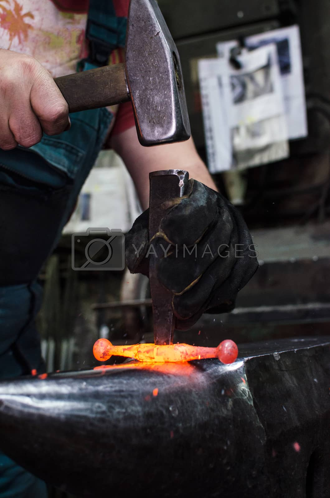 Royalty free image of Blacksmith at work by noskaphoto