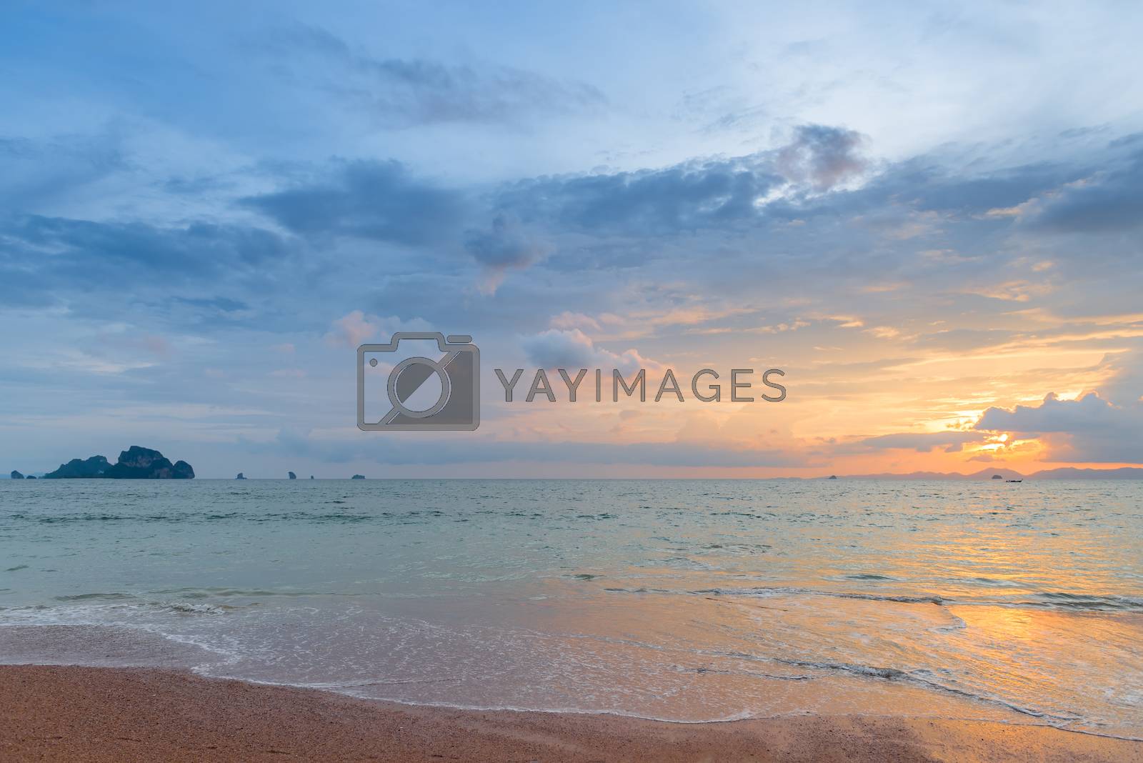 Royalty free image of beautiful orange and pink sky during sunset over the calm sea in by kosmsos111