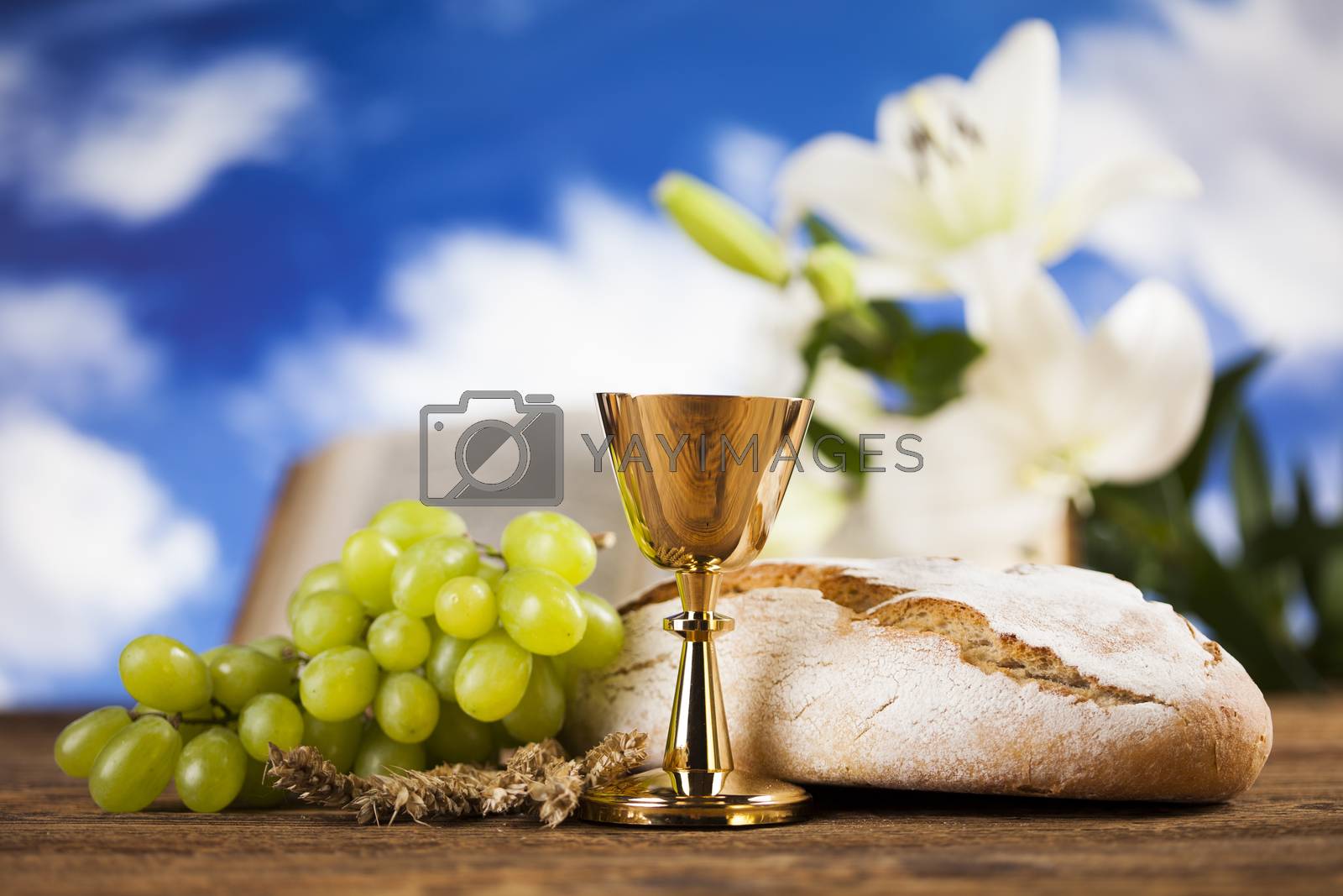 Royalty free image of Symbol christianity religion a golden chalice with grapes and br by JanPietruszka