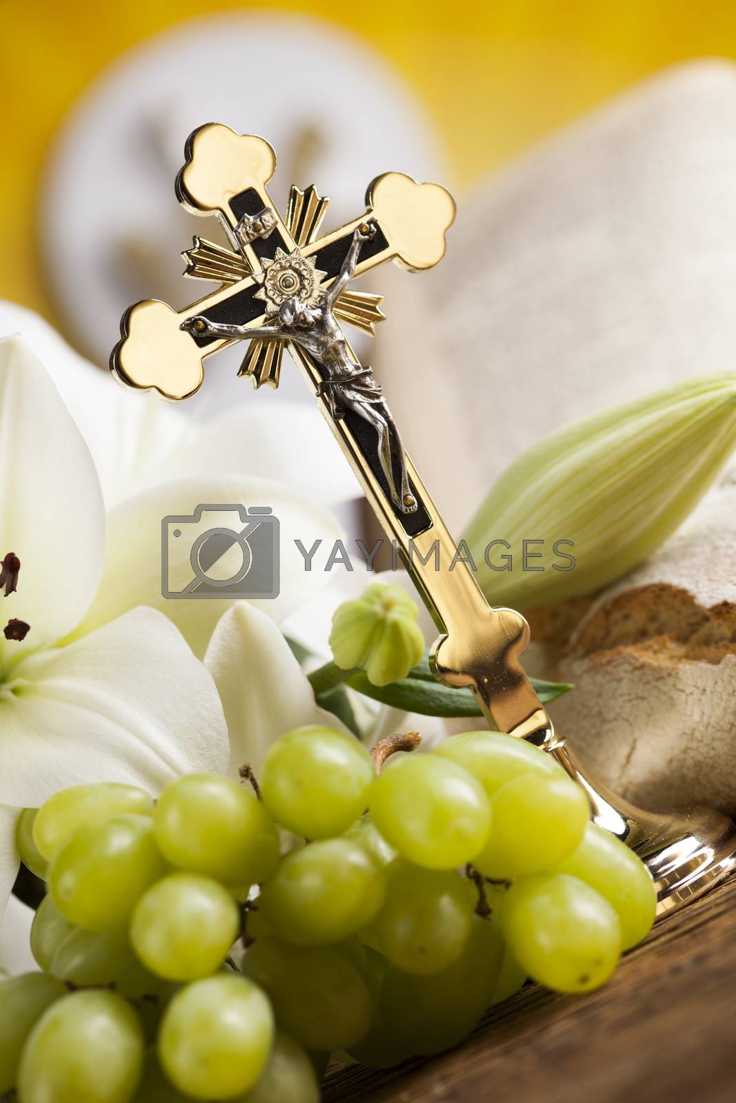 Royalty free image of Holy communion a golden chalice with grapes and bread wafers by JanPietruszka
