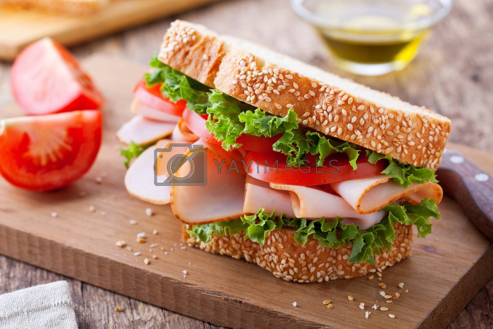 Royalty free image of Smoked Turkey And Tomato Sandwich by mpessaris