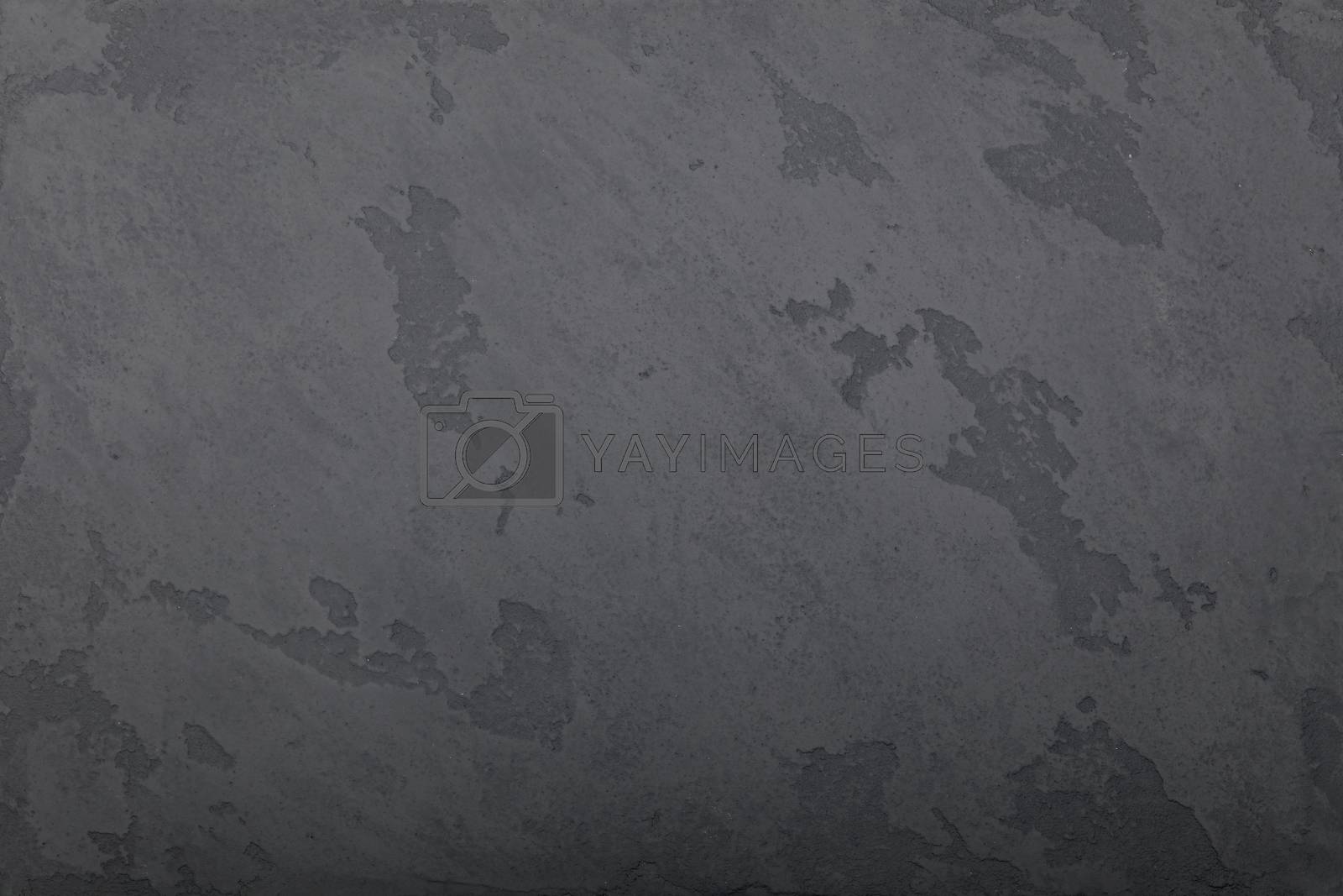 Royalty free image of Grunge grey painted plaster wall background by BreakingTheWalls