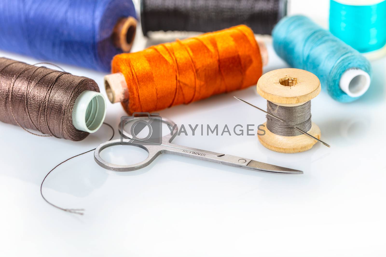 Royalty free image of coils with colorful thread  by MegaArt