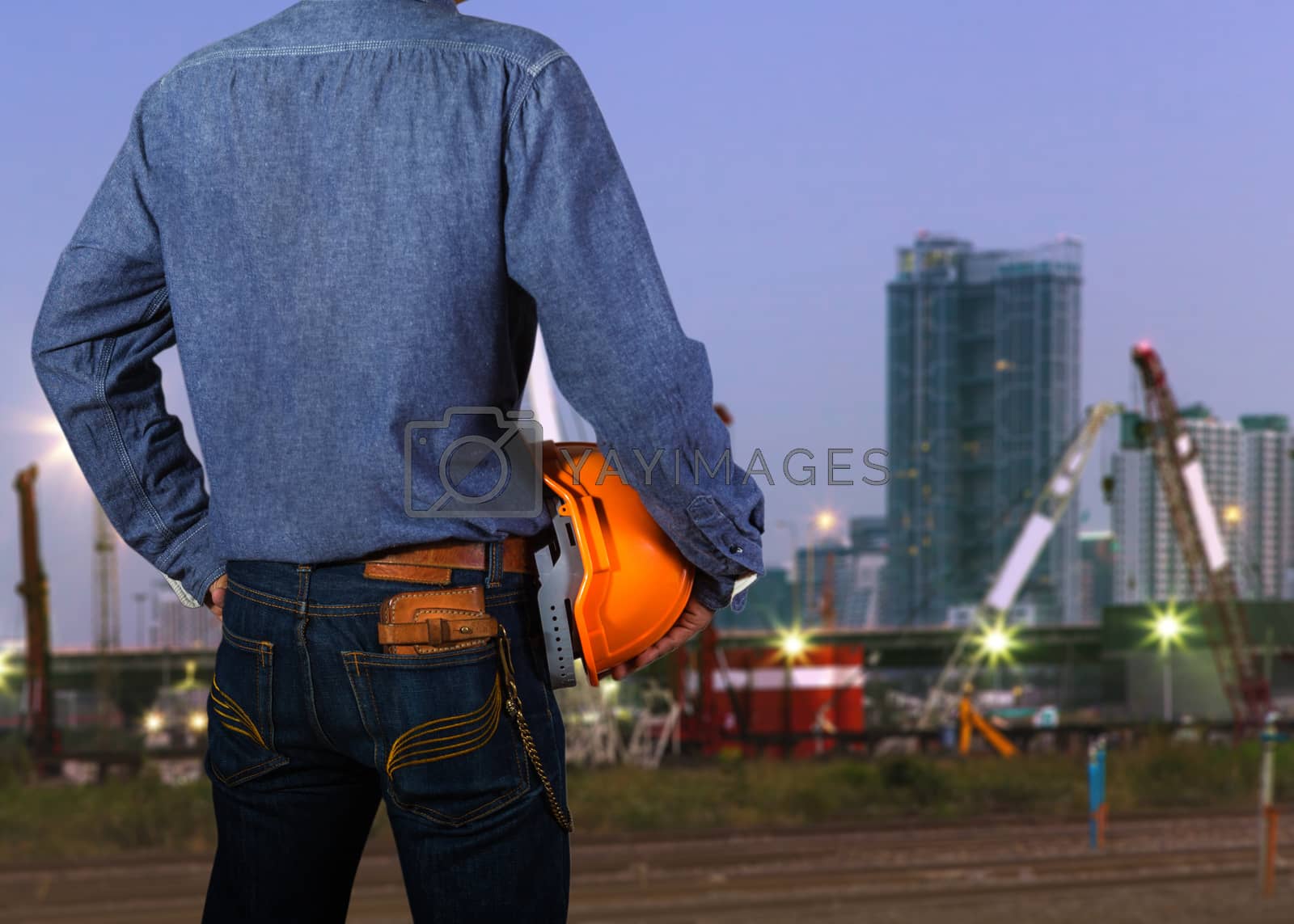 Royalty free image of Cropped view of construction worker by Naypong