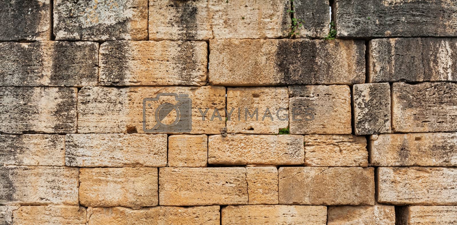 Royalty free image of Texture of stone wall in ancient city, Hierapolis by igor_stramyk