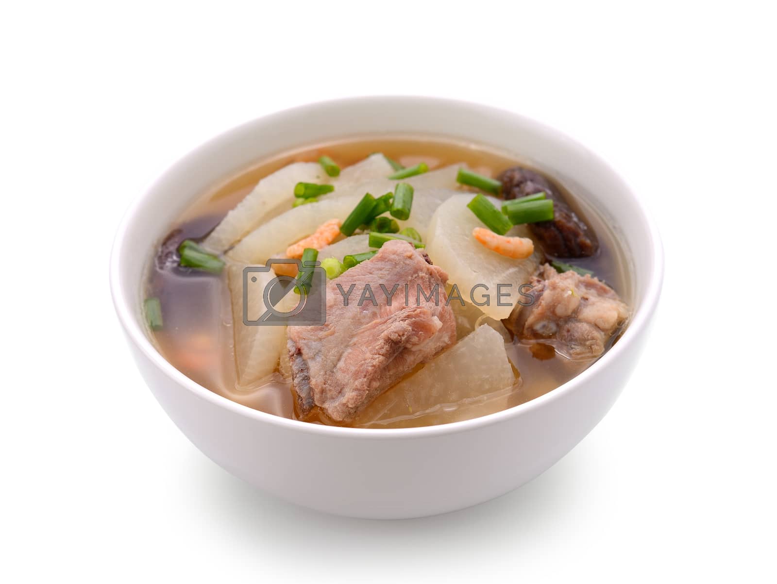 Royalty free image of soup radish with pork serve on bowl, thai food isolated on white by sommai