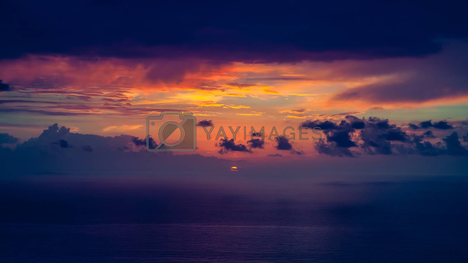 Royalty free image of Dramatic sunset over the sea by Anna_Omelchenko