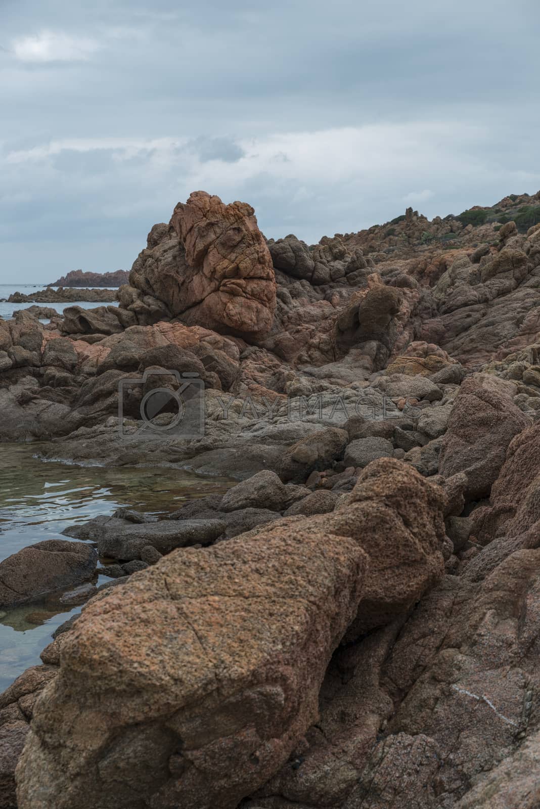 Royalty free image of the rocks of isola rossa sardinia by compuinfoto