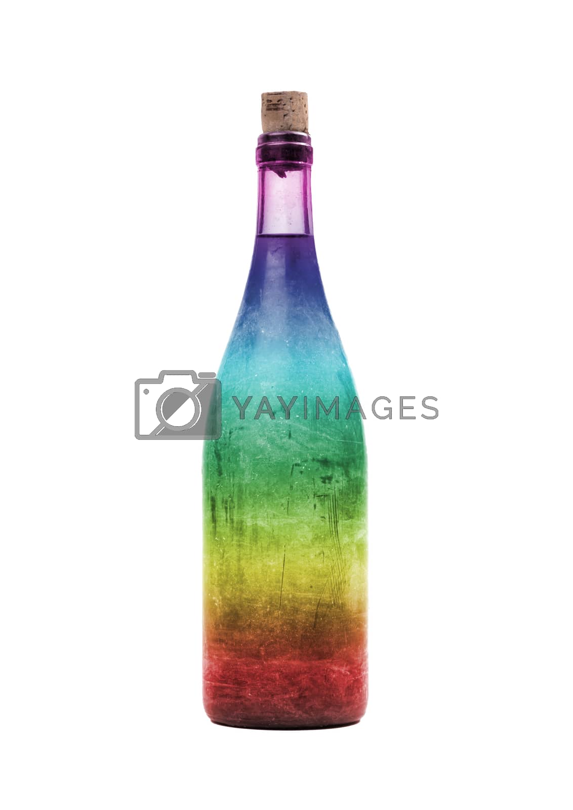 Royalty free image of Old bottle of wine in a rainbow colored bottle, covered in dust by michaklootwijk