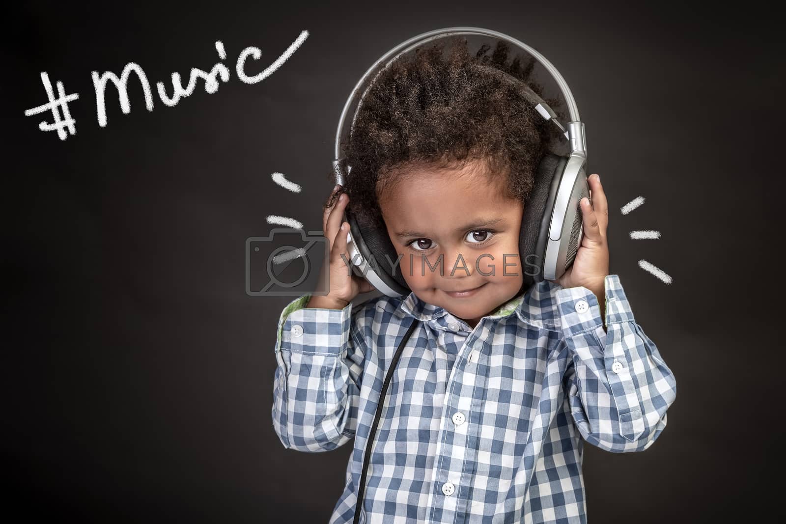 Royalty free image of Little boy in recording studio by Anna_Omelchenko