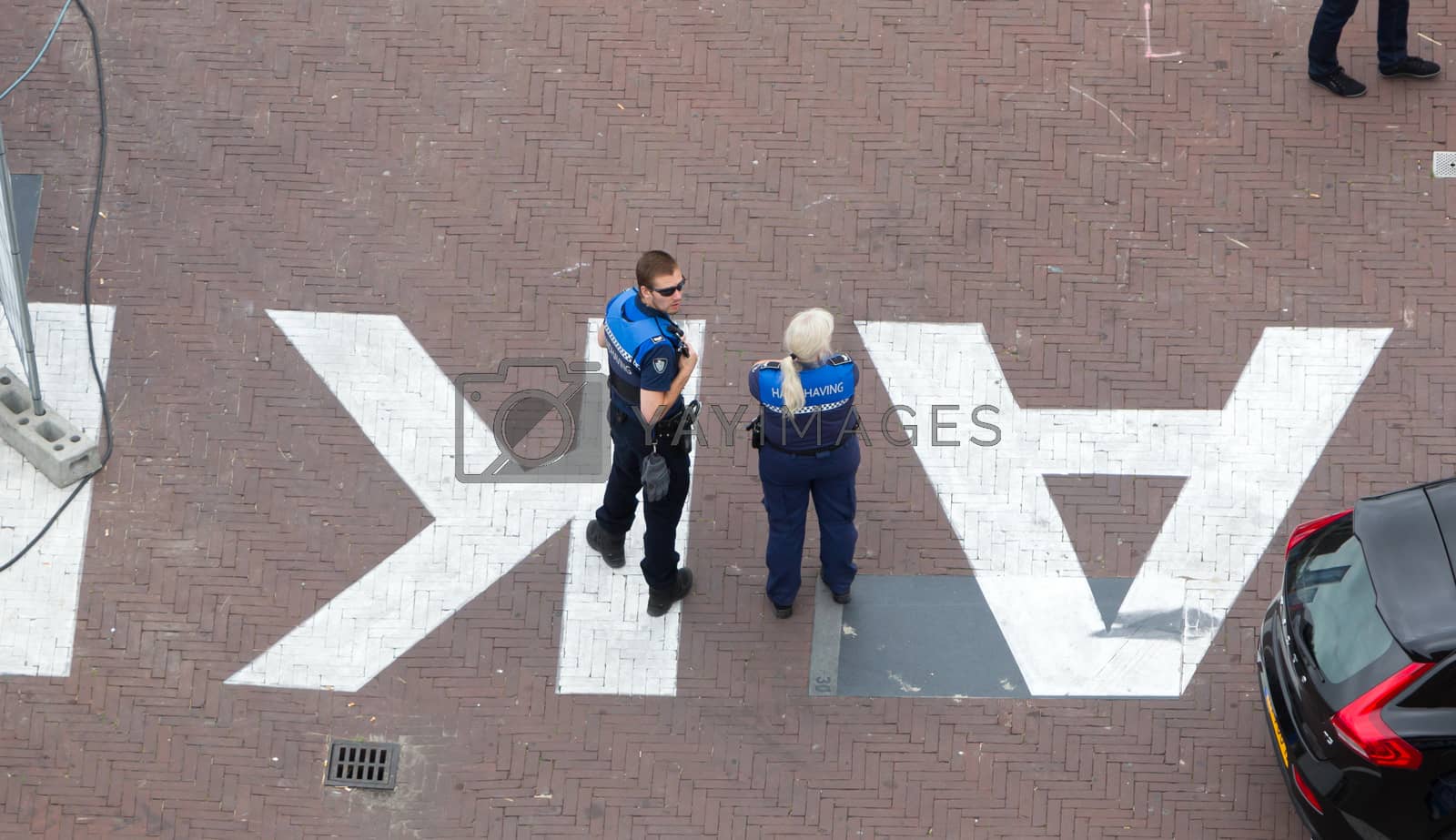 Royalty free image of Law enforcement officers on scooters in Leeuwarden,  the Netherl by michaklootwijk