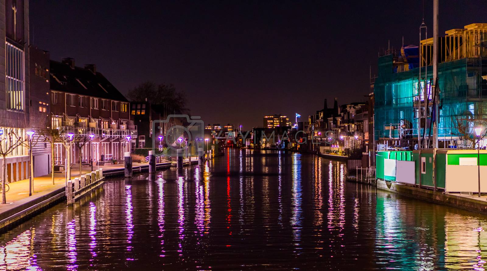 Royalty free image of View on the river with city buildings in Alphen aan den Rijn, The netherlands, Dutch architecture by night by charlottebleijenberg