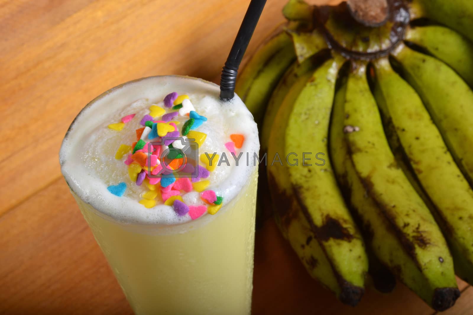 Royalty free image of banana milkshake drink by antonihalim