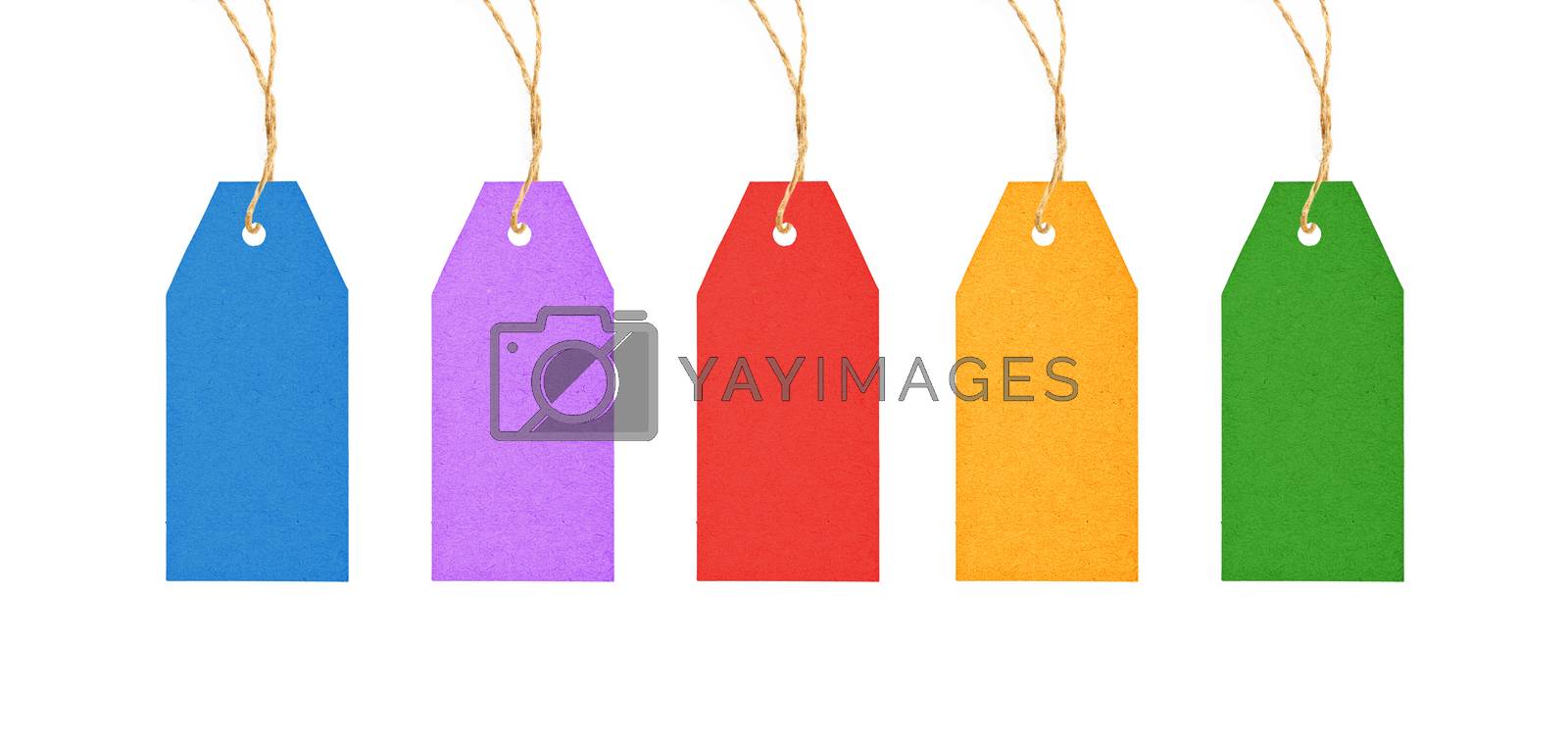 Royalty free image of Paper label tags hanging isolated on white by BreakingTheWalls
