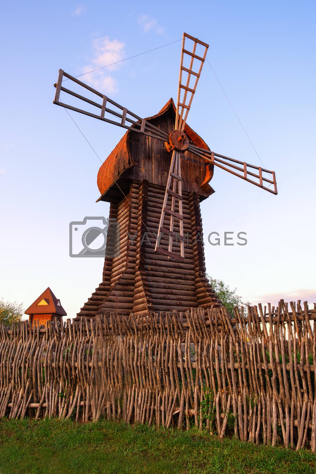 Royalty free image of Windmill traditional rural wind energy mill farm power ecology w by aleksei_romankin