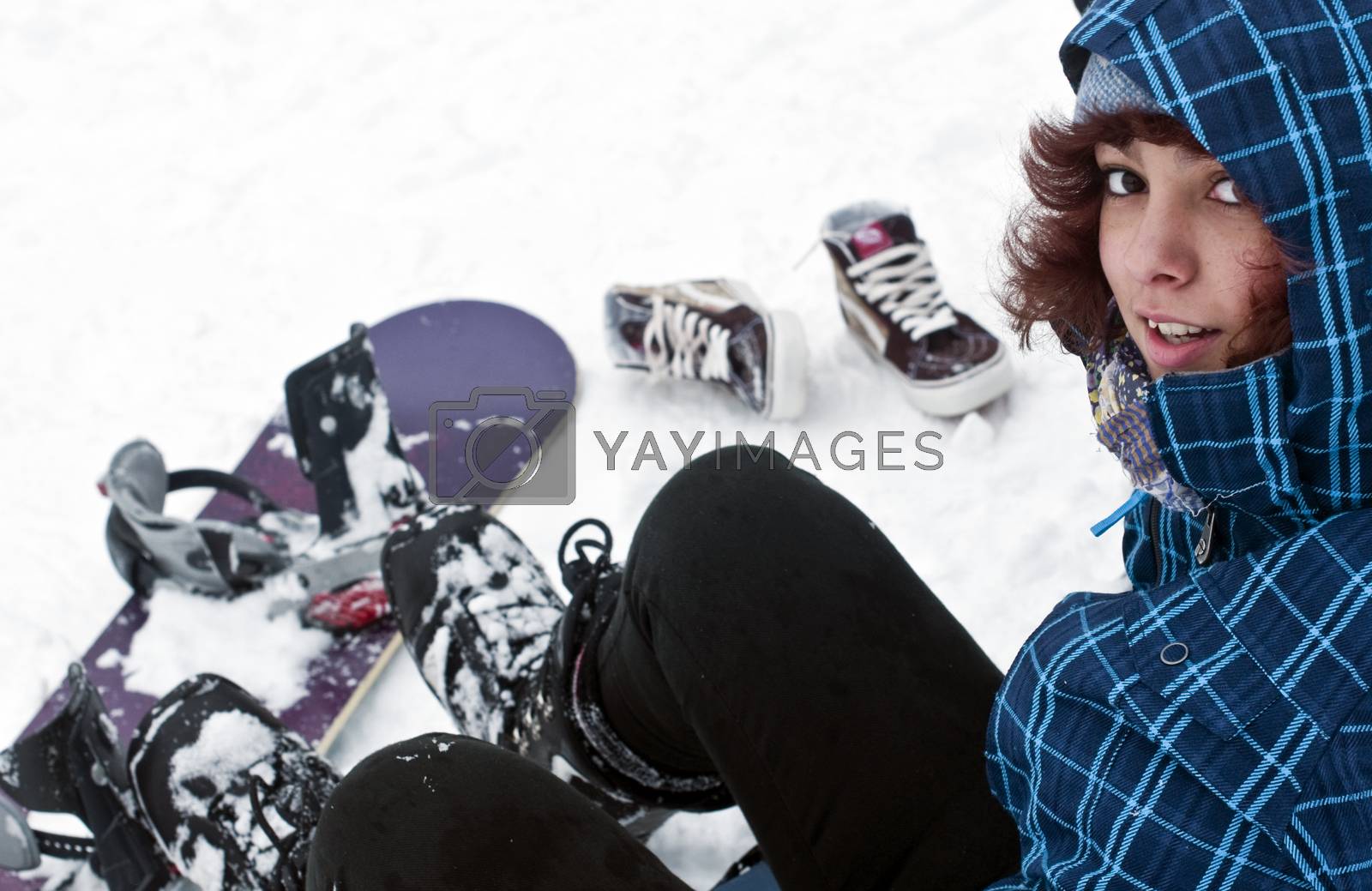 Royalty free image of Girl with snowboard by birckoff
