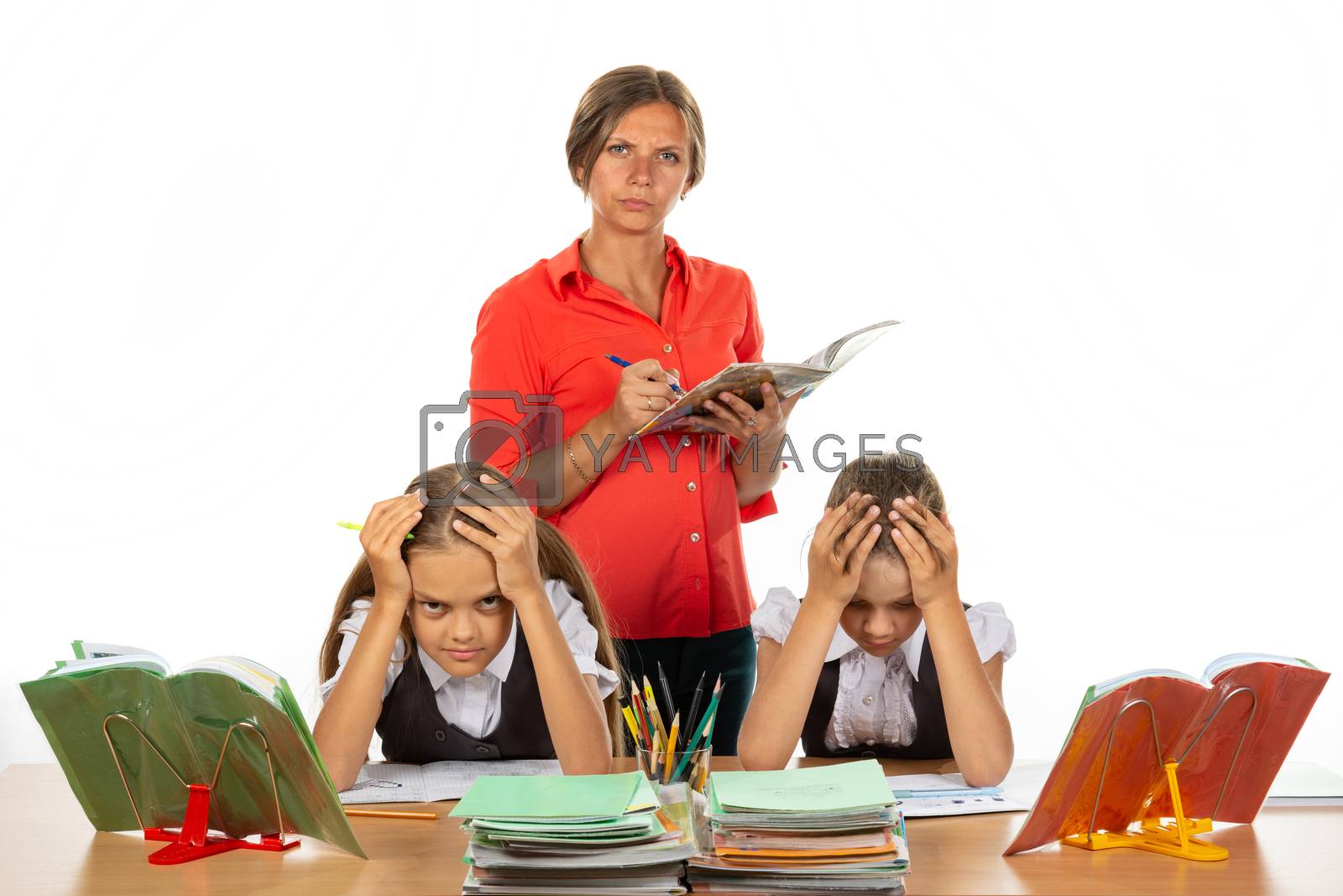Royalty free image of Strict teacher grades students by Madhourse