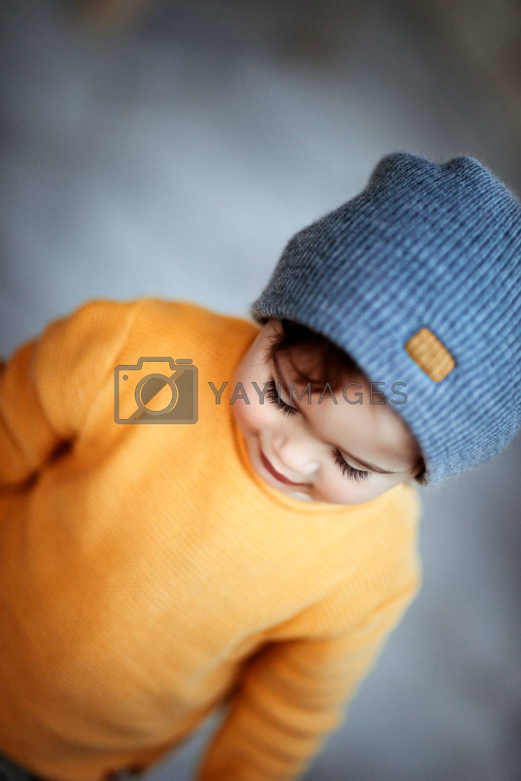 Cute baby boy wearing stylish warm clothes, kids fashion, autumn season, cute trendy little child
