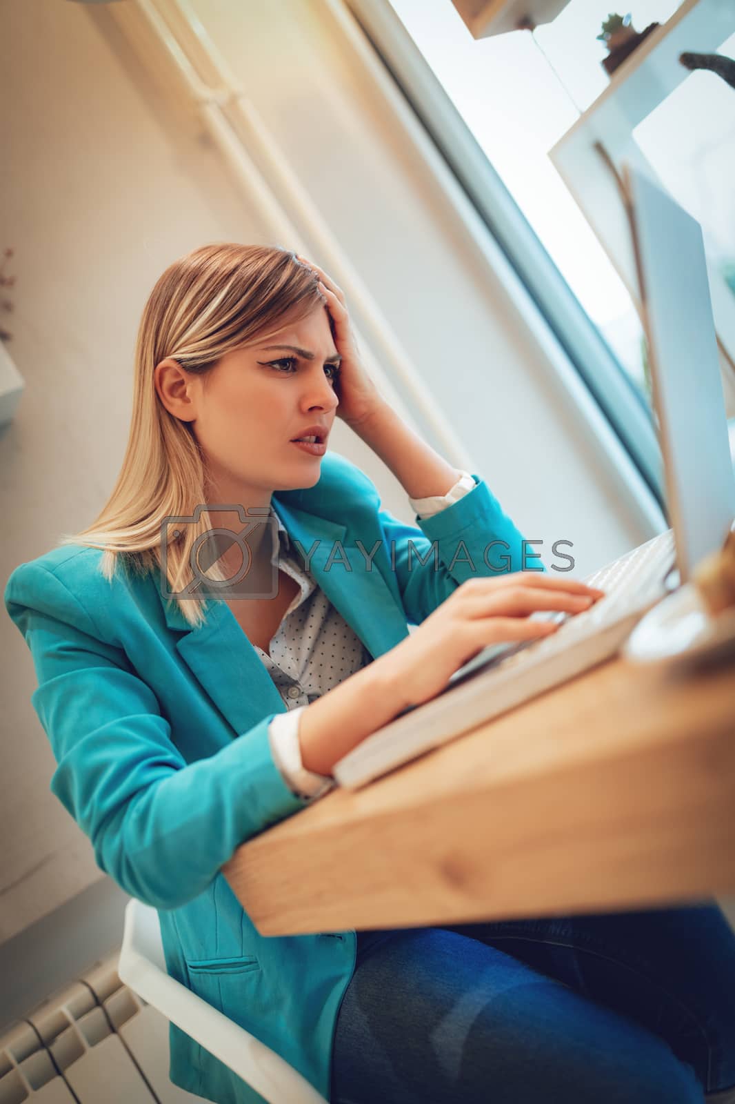 Royalty free image of Stressed Businesswoman by MilanMarkovic78