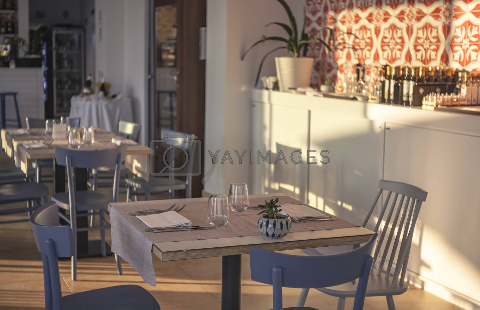 Royalty free image of Restaurant tables by pippocarlot